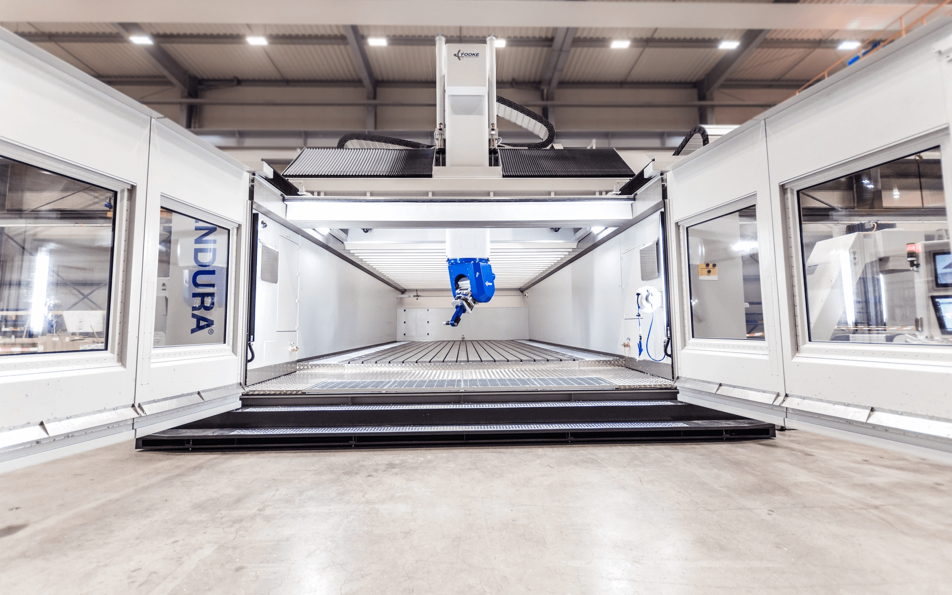 FOOKE 5-axis gantry milling machine machining large aluminum aerospace fuselage panel with high-speed precision cutting